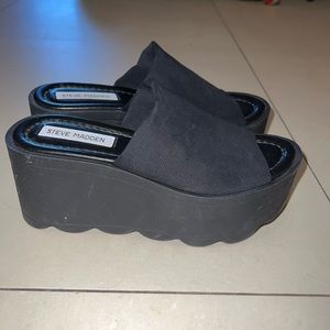 Brand new Steve Madden black platform slides, size 7.